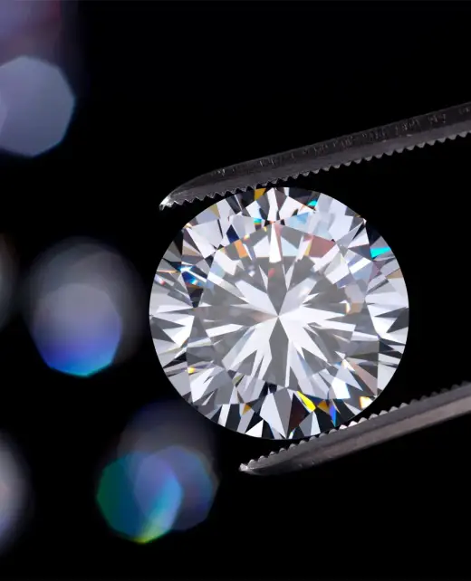 jewelrs-tweezers-holding-a-diamond